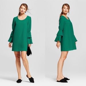 Green shift dress with sleeve detail